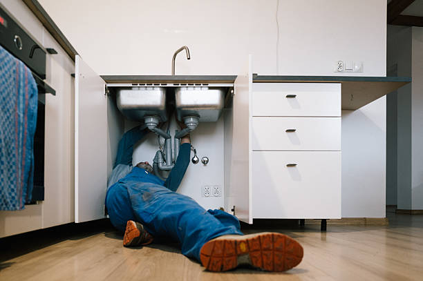 Professional Drain Cleaning technician working in Siloam, GA